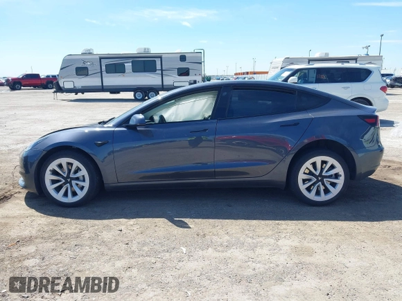 2023 Tesla Model 3 with VIN 5YJ3E1EAXPF617388, listed as a IAAI auction lot 42218748 with Not provided miles and . Bid and sale history available at DreamBid. Image 14.