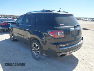 2014 GMC Acadia Denali with VIN 1GKKRTKD1EJ158482, listed as a IAAI auction lot 41826579 with 167,043 mi miles. Bid and sale history available at carsss.com. Image 3.