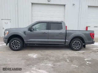2023 Ford F-150 XL with VIN 1FTEW1EP9PFA08766, listed as a IAAI auction lot 41223088 with 34,421 mi miles. Bid and sale history available at carsss.com. Image 15.