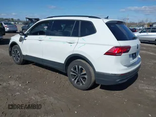 2024 Volkswagen Tiguan S with VIN 3VVFB7AX7RM063715, listed as a IAAI auction lot 41974650 with 23,374 mi miles and . Bid and sale history available at DreamBid. Image 3.