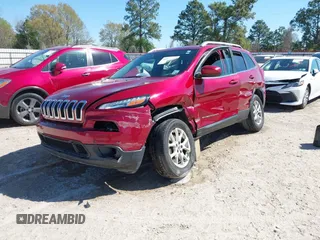 2015 Jeep Cherokee North with VIN 1C4PJMCSXFW654090, listed as a IAAI auction lot 41844434 with 198,592 mi miles. Bid and sale history available at carsss.com. Image 2.