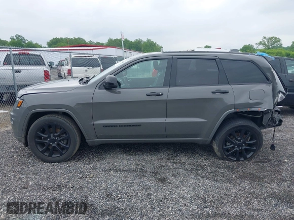 2021 Jeep Grand Cherokee Laredo E with VIN 1C4RJFAG1MC655503, listed as a IAAI auction lot 42387765 with 38,423 mi miles and . Bid and sale history available at DreamBid. Image 14.