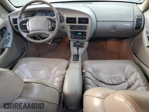 1996 Buick Regal with VIN 2G4WF52KXT1512650, listed as a Copart auction lot 79048884 with 225,558 mi miles and Salvage Title. Bid and sale history available at DreamBid. Image 8.