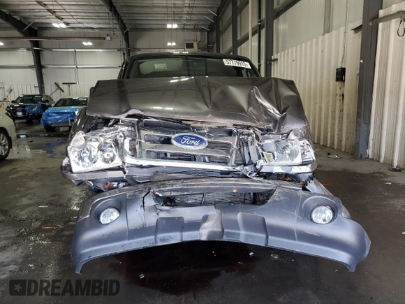 2010 Ford Ranger XLT with VIN 1FTKR4EE4APA29763, listed as a Copart auction lot 57779915 with 158,941 mi miles and Salvage title. Bid and sale history available at DreamBid. Image 5.