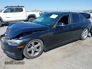 2015 BMW 3 Series 320i with VIN WBA3B1C57FK138441, listed as a IAAI auction lot 42034649 with Not Provided miles. Bid and sale history available at carsss.com. Image 16.
