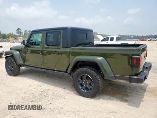 2023 Jeep Gladiator Freedom z VIN 1C6HJTAG9PL543165, wystawiony jako Copart lot #58003895 z przebiegiem 43 614 mil mil oraz Szkoda całkowita • Salvage title. Historia ofert i sprzedaży dostępna na DreamBid. Obrazek 2.