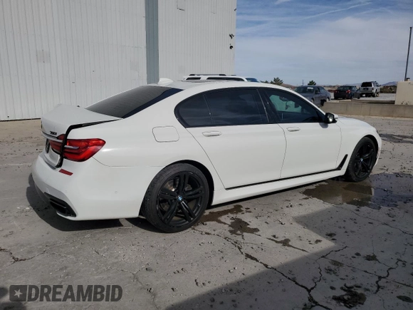 2016 BMW 7 Series 750i xDrive z VIN WBA7F2C50GG421120, wystawiony jako Copart lot #75668694 z przebiegiem 83 178 mil mil oraz Szkoda całkowita • Salvage title. Historia ofert i sprzedaży dostępna na DreamBid. Obrazek 3.