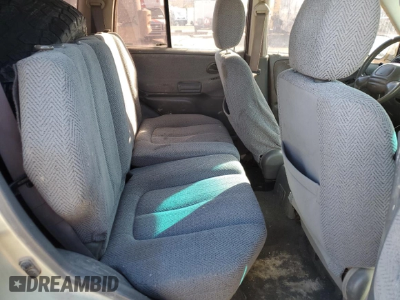 1999 Suzuki Grand Vitara JLX z VIN JS3TD62V0X4113058, wystawiony jako Copart lot #80089884 z przebiegiem 165 794 mil mil oraz Szkoda całkowita • Salvage title. Historia ofert i sprzedaży dostępna na DreamBid. Obrazek 11.