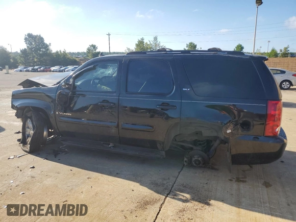 2007 GMC Yukon SLT with VIN 1GKFK13077J140514, listed as a Copart auction lot 72272084 with Not Provided miles and Salvage Title. Bid and sale history available at DreamBid. Image 2.