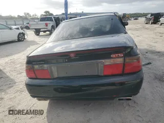 2002 Cadillac Seville Luxury SLS z VIN 1G6KS54Y42U220496, wystawiony jako Copart lot #80883764 z przebiegiem 221 629 mil mil oraz Czysty tytuł • Clean title. Historia ofert i sprzedaży dostępna na DreamBid. Obrazek 6.