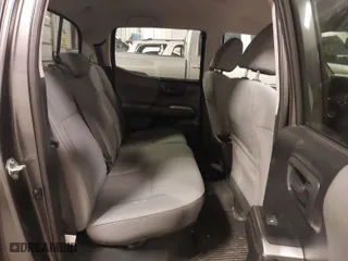 2019 Toyota Tacoma 4WD SR with VIN 3TMCZ5AN9KM275537, listed as a IAAI auction lot 41956988 with 102,933 mi miles. Bid and sale history available at carsss.com. Image 8.