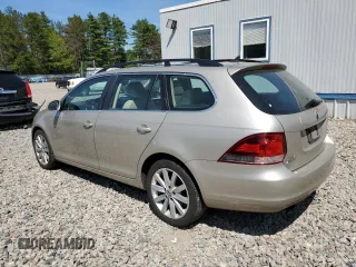 2014 Volkswagen Jetta TDI w/Sunroof with VIN 3VWPL7AJ5EM606949, listed as a Copart auction lot 58863125 with 131,179 mi miles and Clean title. Bid and sale history available at DreamBid. Image 2.