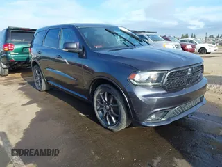 2015 Dodge Durango R/T with VIN 1C4SDJCT1FC188401, listed as a IAAI auction lot 42124652 with 86,339 mi miles and . Bid and sale history available at carsss.com. Image 1.