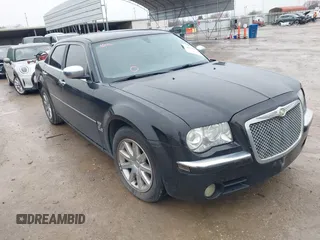 2007 Chrysler 300 C with VIN 2C3KA63H77H885995, listed as a IAAI auction lot 41567603 with 57,555 mi miles. Bid and sale history available at carsss.com. Image 1.