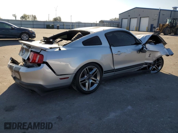 2010 Ford Mustang GT500 with VIN 1ZVBP8JS3A5156425, listed as a Copart auction lot 77348134 with 61,984 mi miles and Salvage title. Bid and sale history available at DreamBid. Image 3.