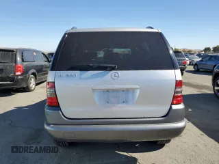 1999 Mercedes-Benz M-Class with VIN 4JGAB54E6XA117647, listed as a Copart auction lot 77284714 with 124,150 mi miles and Clean Title. Bid and sale history available at carsss.com. Image 6.