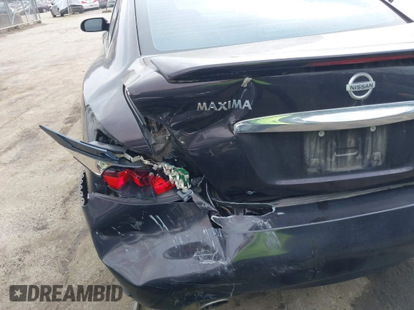 2013 Nissan Maxima S with VIN 1N4AA5AP6DC841261, listed as a IAAI auction lot 41673912 with 191,500 mi miles and . Bid and sale history available at DreamBid. Image 6.
