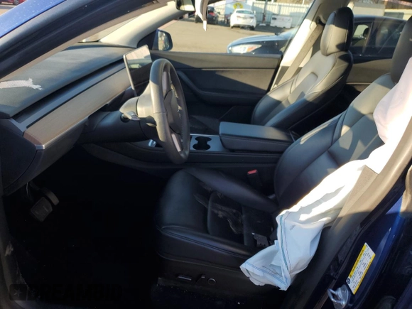 2021 Tesla Model Y Long Range with VIN 5YJYGAEE2MF262571, listed as a Copart auction lot 47309485 with 57,431 mi miles and Salvage Title. Bid and sale history available at carsss.com. Image 7.