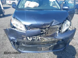 2018 Toyota Sienna LE with VIN 5TDJZ3DC4JS189041, listed as a IAAI auction lot 41610754 with 61,862 mi miles and . Bid and sale history available at DreamBid. Image 6.
