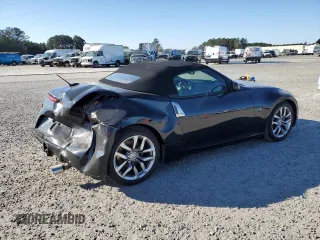 2014 Nissan 370Z Touring with VIN JN1AZ4FH3EM620195, listed as a Copart auction lot 83207104 with 66,974 mi miles and Salvage Title. Bid and sale history available at DreamBid. Image 3.