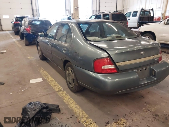 2000 Nissan Altima XE with VIN 1N4DL01D4YC185986, listed as a IAAI auction lot 41831774 with 217,044 mi miles. Bid and sale history available at carsss.com. Image 3.