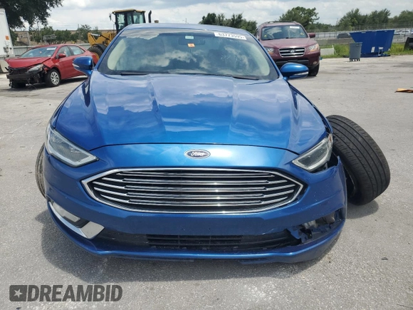2018 Ford Fusion Titanium with VIN 3FA6P0D97JR219690, listed as a Copart auction lot 63773595 with 138,066 mi miles and Salvage title. Bid and sale history available at DreamBid. Image 5.