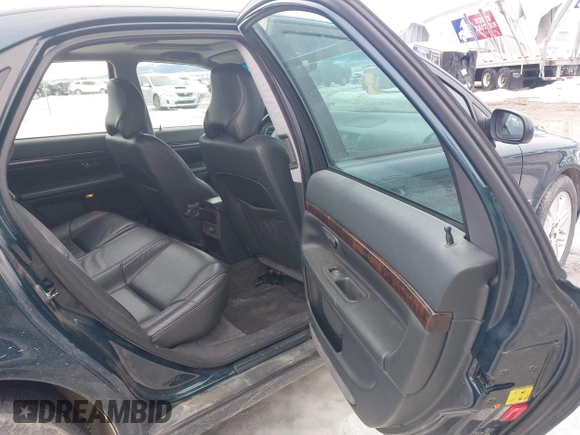 1999 Volvo S80 with VIN YV1TS90D5X1014909, listed as a IAAI auction lot 41644130 with 127,240 mi miles. Bid and sale history available at carsss.com. Image 8.