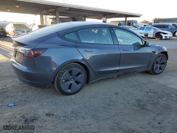 2022 Tesla Model 3 with VIN 5YJ3E1EA8NF201711, listed as a Copart auction lot 88704675 with 25,714 mi miles and Salvage Title. Bid and sale history available at carsss.com. Image 3.