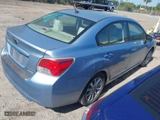 2012 Subaru Impreza Sedan 2.0i Premium with VIN JF1GJAC64CH017848, listed as a IAAI auction lot 42054205 with 169,906 mi miles. Bid and sale history available at carsss.com. Image 4.