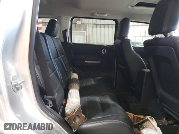 2008 Dodge Nitro R/T z VIN 1D8GU58618W151545, wystawiony jako Copart lot #75465574 z przebiegiem Nie podano mil oraz Szkoda całkowita • Salvage title. Historia ofert i sprzedaży dostępna na DreamBid. Obrazek 11.