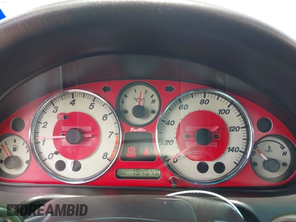 2002 Mazda MX-5 Miata Cloth z VIN JM1NB353020225252, wystawiony jako IAAI lot #42303820 z przebiegiem 194 549 mil mil oraz . Historia ofert i sprzedaży dostępna na DreamBid. Obrazek 7.