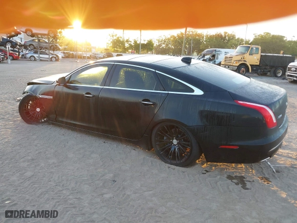 2018 Jaguar XJ with VIN SAJWJ2GD3J8W15092, listed as a IAAI auction lot 41844106 with 56,357 mi miles. Bid and sale history available at carsss.com. Image 3.