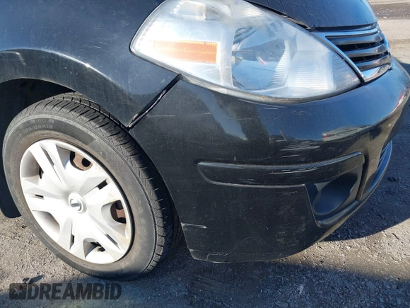 2010 Nissan Versa 1.8 SL with VIN 3N1BC1CP5AL463709, listed as a IAAI auction lot 41614325 with 112,771 mi miles. Bid and sale history available at carsss.com. Image 15.