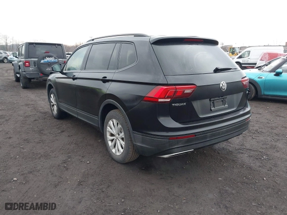 2018 Volkswagen Tiguan S with VIN 3VV1B7AX9JM091210, listed as a IAAI auction lot 41683380 with 63,627 mi miles. Bid and sale history available at carsss.com. Image 3.