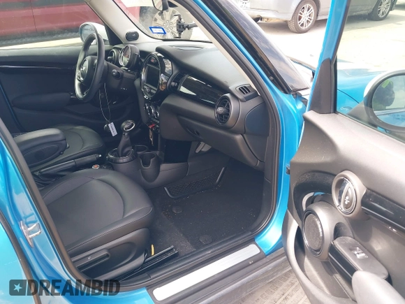 2017 MINI Hardtop 4 Door Cooper with VIN WMWXU1C53H2E17614, listed as a IAAI auction lot 41686204 with 53,409 mi miles and . Bid and sale history available at DreamBid. Image 5.