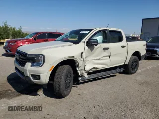 2025 Ford Ranger XLT with VIN 1FTER4HH9SLE14313, listed as a Copart auction lot 59597415 with 1,231 mi miles and Salvage title. Bid and sale history available at DreamBid. Image 1.