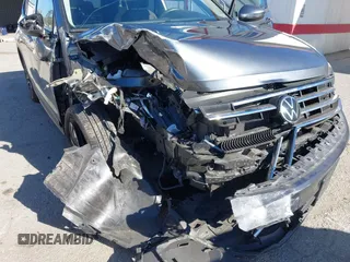 2022 Volkswagen Tiguan S with VIN 3VV1B7AX9NM055507, listed as a IAAI auction lot 41383597 with 25,546 mi miles and . Bid and sale history available at DreamBid. Image 6.