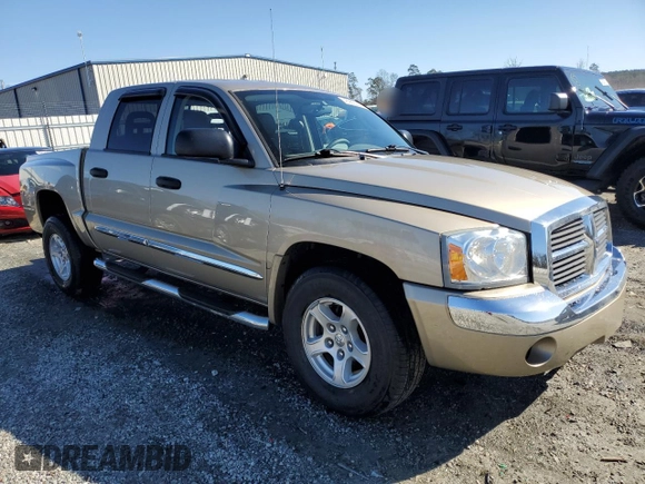 2005 Dodge Dakota Laramie with VIN 1D7HW58N15S326888, listed as a Copart auction lot 43965075 with 87,287 mi miles and Salvage Title. Bid and sale history available at DreamBid. Image 4.