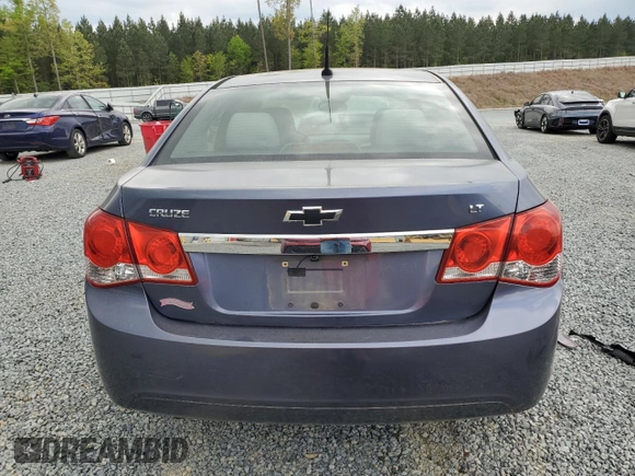 2013 Chevrolet Cruze 1LT with VIN 1G1PC5SBXD7203047, listed as a Copart auction lot 52598515 with 147,948 mi miles and Salvage Title. Bid and sale history available at carsss.com. Image 6.