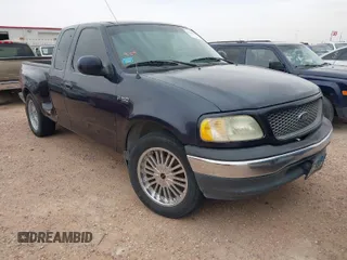 2001 Ford F-150 z VIN 2FTZX072X1CA99284, wystawiony jako IAAI lot #41981266 z przebiegiem 226 792 mil mil oraz . Historia ofert i sprzedaży dostępna na DreamBid. Obrazek 1.
