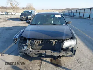 2015 Chrysler 300 with VIN 2C3CCAGG8FH808618, listed as a IAAI auction lot 41695711 with 137,050 mi miles. Bid and sale history available at carsss.com. Image 13.