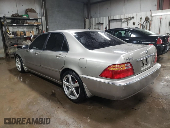2002 Acura RL z VIN JH4KA96502C012064, wystawiony jako Copart lot #88080895 z przebiegiem 107 477 mil mil oraz Szkoda całkowita • Salvage title. Historia ofert i sprzedaży dostępna na DreamBid. Obrazek 2.