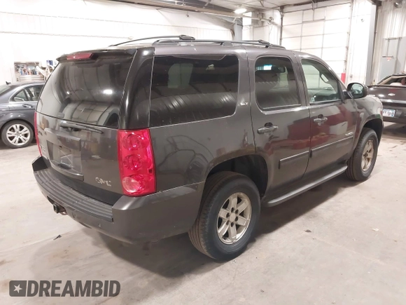 2010 GMC Yukon SLT with VIN 1GKUKCE08AR148548, listed as a IAAI auction lot 41994933 with 248,534 mi miles. Bid and sale history available at carsss.com. Image 4.