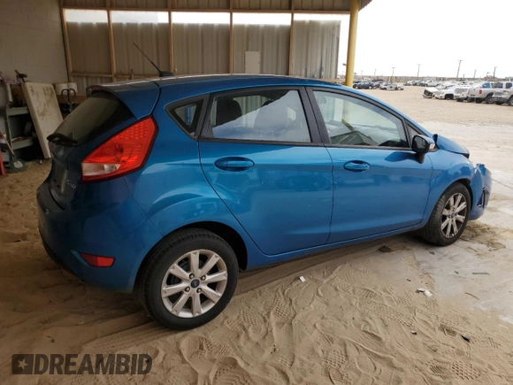 2013 Ford Fiesta SE z VIN 3FADP4EJ7DM216071, wystawiony jako Copart lot #58629155 z przebiegiem 73 407 mil mil oraz Szkoda całkowita • Salvage title. Historia ofert i sprzedaży dostępna na DreamBid. Obrazek 3.