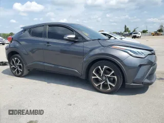 2022 Toyota C-HR XLE z VIN NMTKHMBX2NR140945, wystawiony jako Copart lot #58809375 z przebiegiem 56 161 mil mil oraz Nie do naprawy • Non repairable. Historia ofert i sprzedaży dostępna na DreamBid. Obrazek 4.