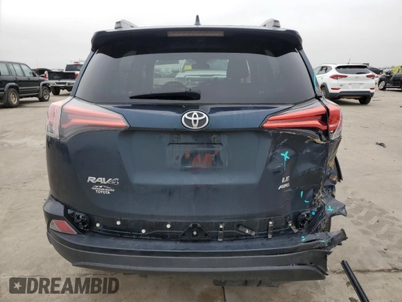 2017 Toyota RAV4 LE with VIN 2T3BFREV3HW579265, listed as a Copart auction lot 43581975 with 100,205 mi miles and Salvage Title. Bid and sale history available at carsss.com. Image 6.