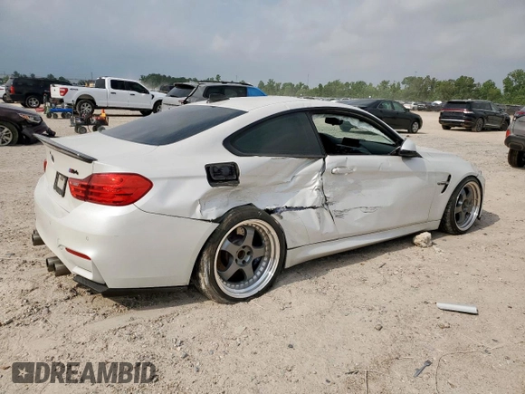 2015 BMW M4 with VIN WBS3R9C5XFK332533, listed as a Copart auction lot 57030615 with 97,739 mi miles and Salvage title. Bid and sale history available at DreamBid. Image 3.