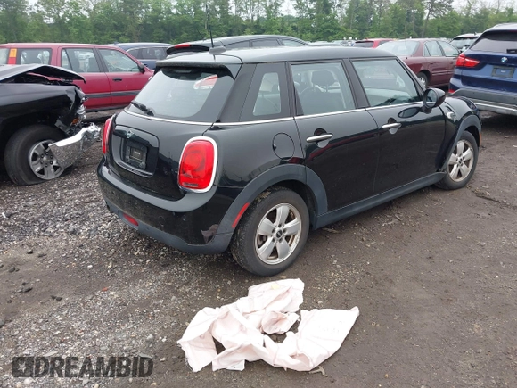 2020 MINI Hardtop 4 Door Cooper with VIN WMWXU7C04L2L58635, listed as a IAAI auction lot 42383785 with 27,160 mi miles and . Bid and sale history available at DreamBid. Image 4.