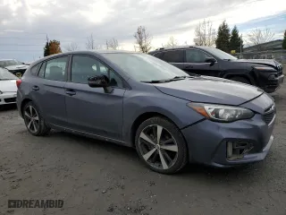 2017 Subaru Impreza Sport with VIN 4S3GTAK6XH1751786, listed as a Copart auction lot 86219994 with 121,393 mi miles and Salvage Title. Bid and sale history available at carsss.com. Image 4.