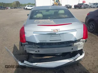 2019 Cadillac CTS Luxury RWD z VIN 1G6AR5SSXK0101168, wystawiony jako IAAI lot #42000452 z przebiegiem 13 114 mil mil oraz . Historia ofert i sprzedaży dostępna na DreamBid. Obrazek 17.